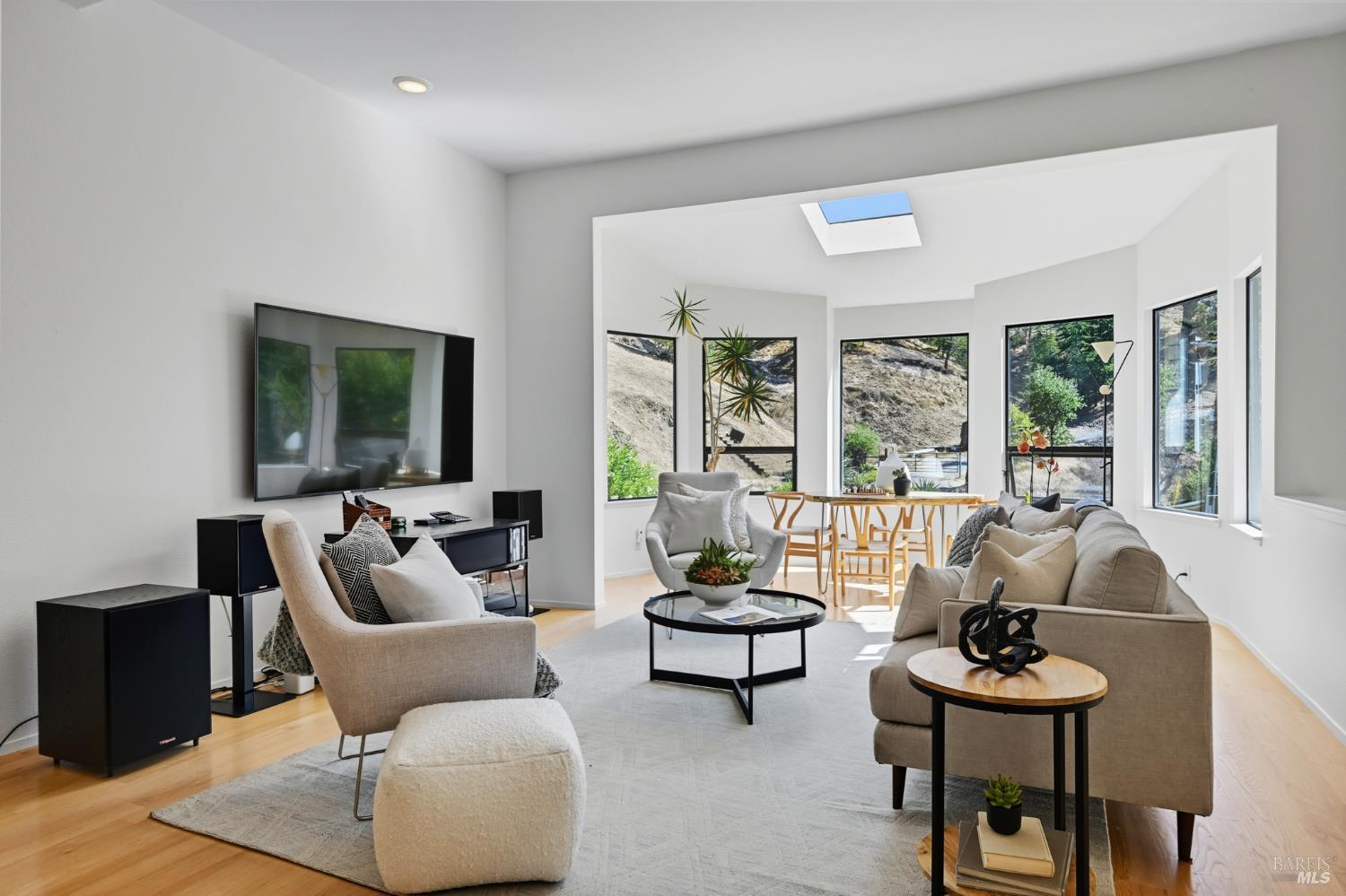 103 Holstein Road San Anselmo, CA 94960 - Photo 30 of 66 a living room with furniture and a large window