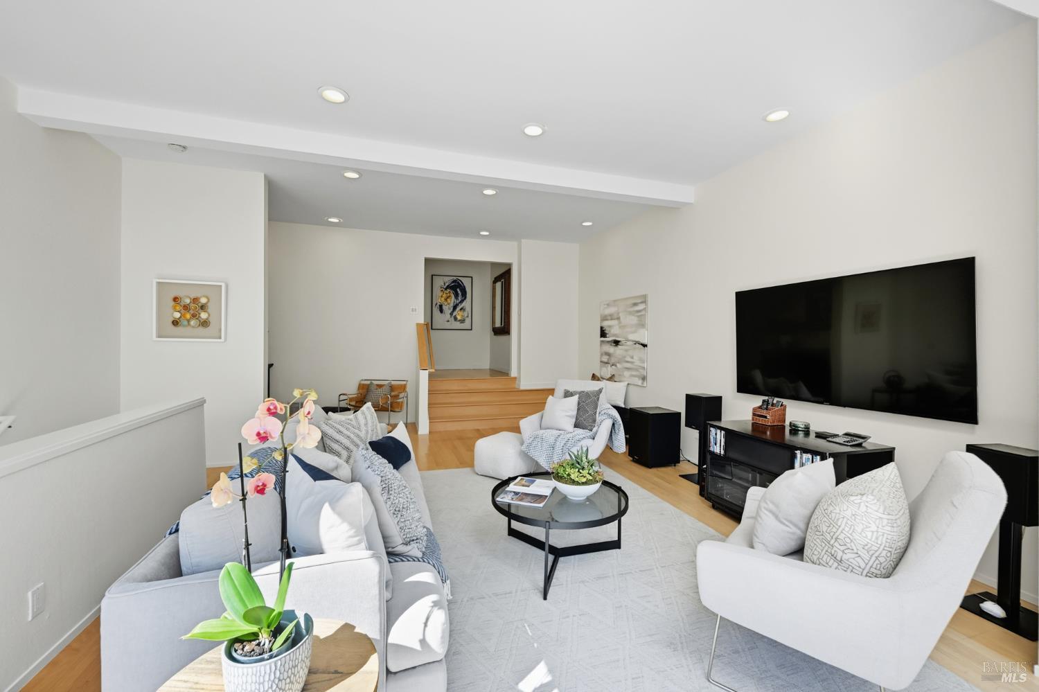 103 Holstein Road San Anselmo, CA 94960 - Photo 34 of 66 a living room with furniture and a flat screen tv