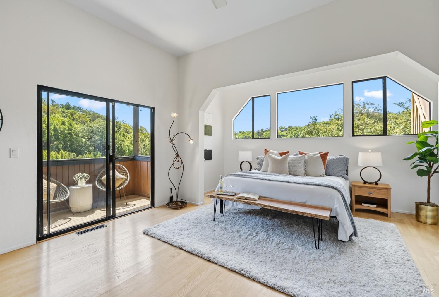 103 Holstein Road San Anselmo, CA 94960 - Photo 37 of 66 a spacious bedroom with a bed and a large window