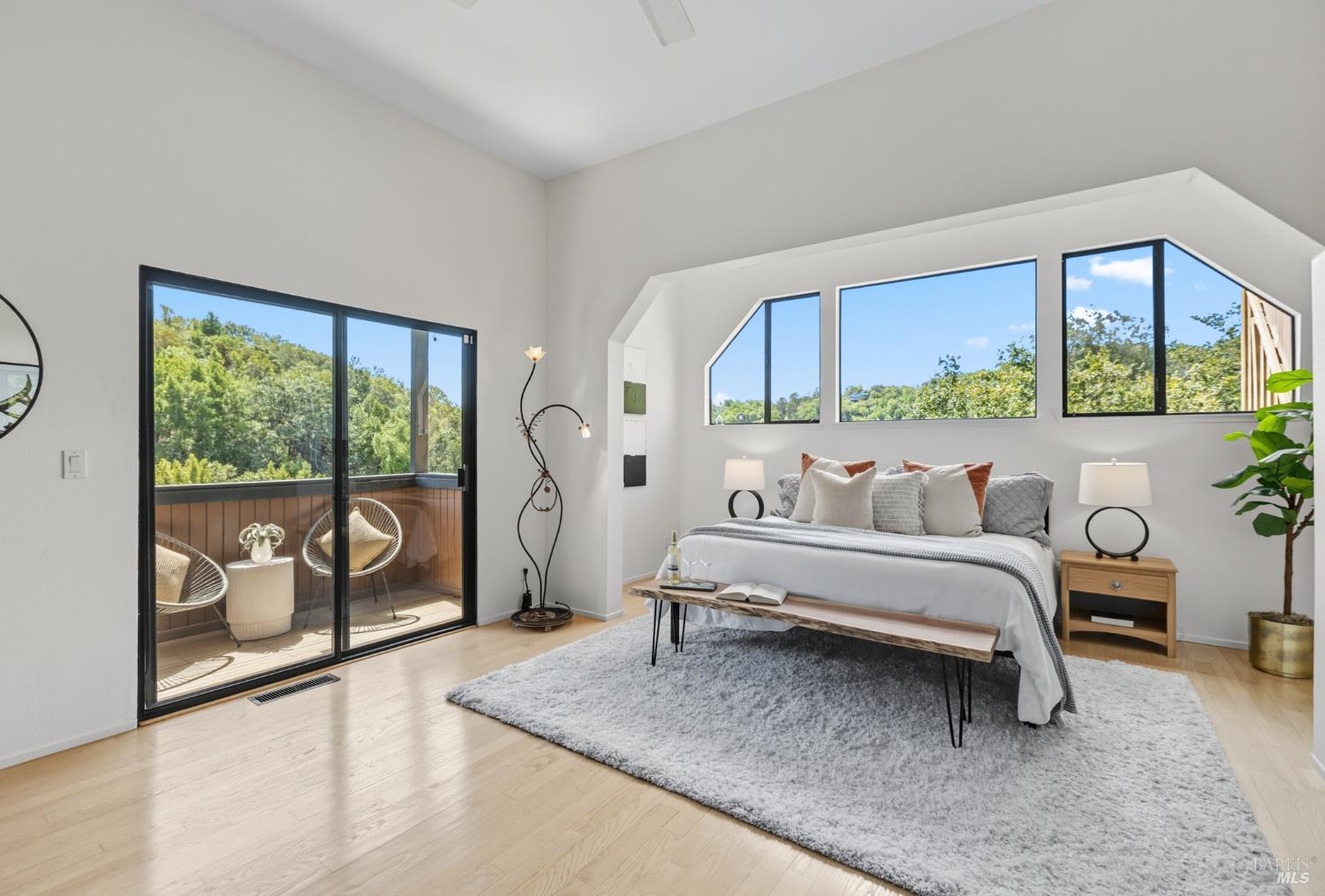 103 Holstein Road San Anselmo, CA 94960 - Photo 39 of 66 a living room with furniture and a floor to ceiling window