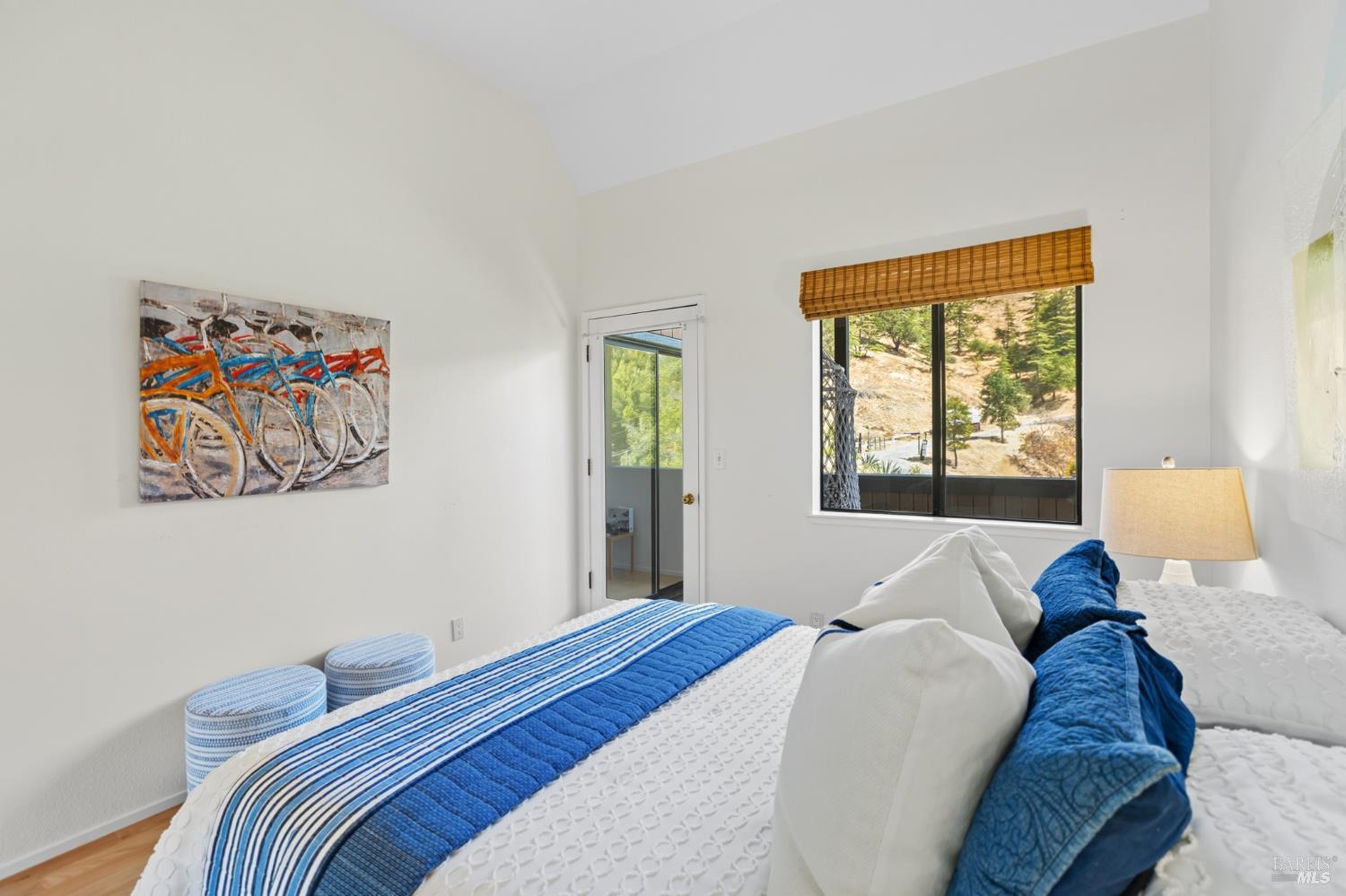 103 Holstein Road San Anselmo, CA 94960 - Photo 46 of 66 a bedroom with a bed and wooden floor