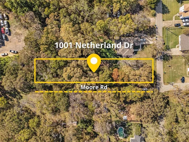 a sign that is on a brick wall