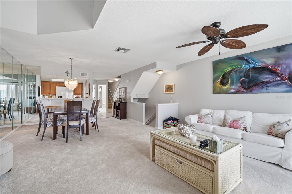 643 Garland Circle Indian Rocks Beach, FL 33785 - Photo 14 of 81 a living room with furniture and kitchen view