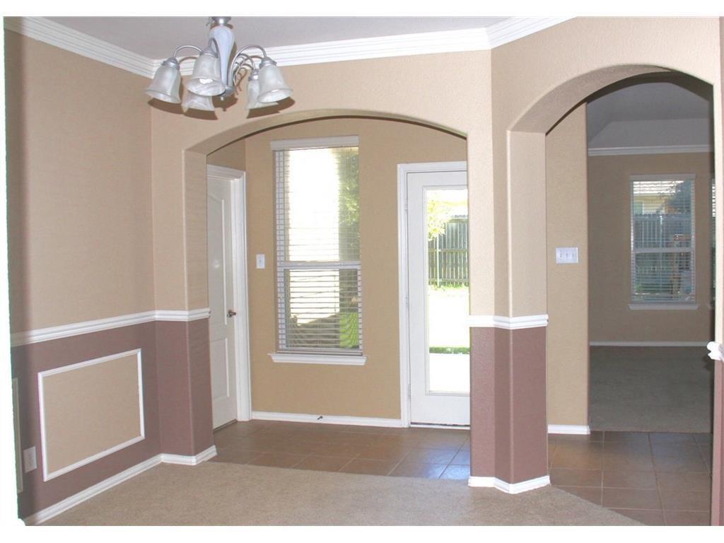 1429 Samantha Creek Drive Little Elm, TX 75068 - Photo 2 of 4 a view of a livingroom with wooden floor and windows