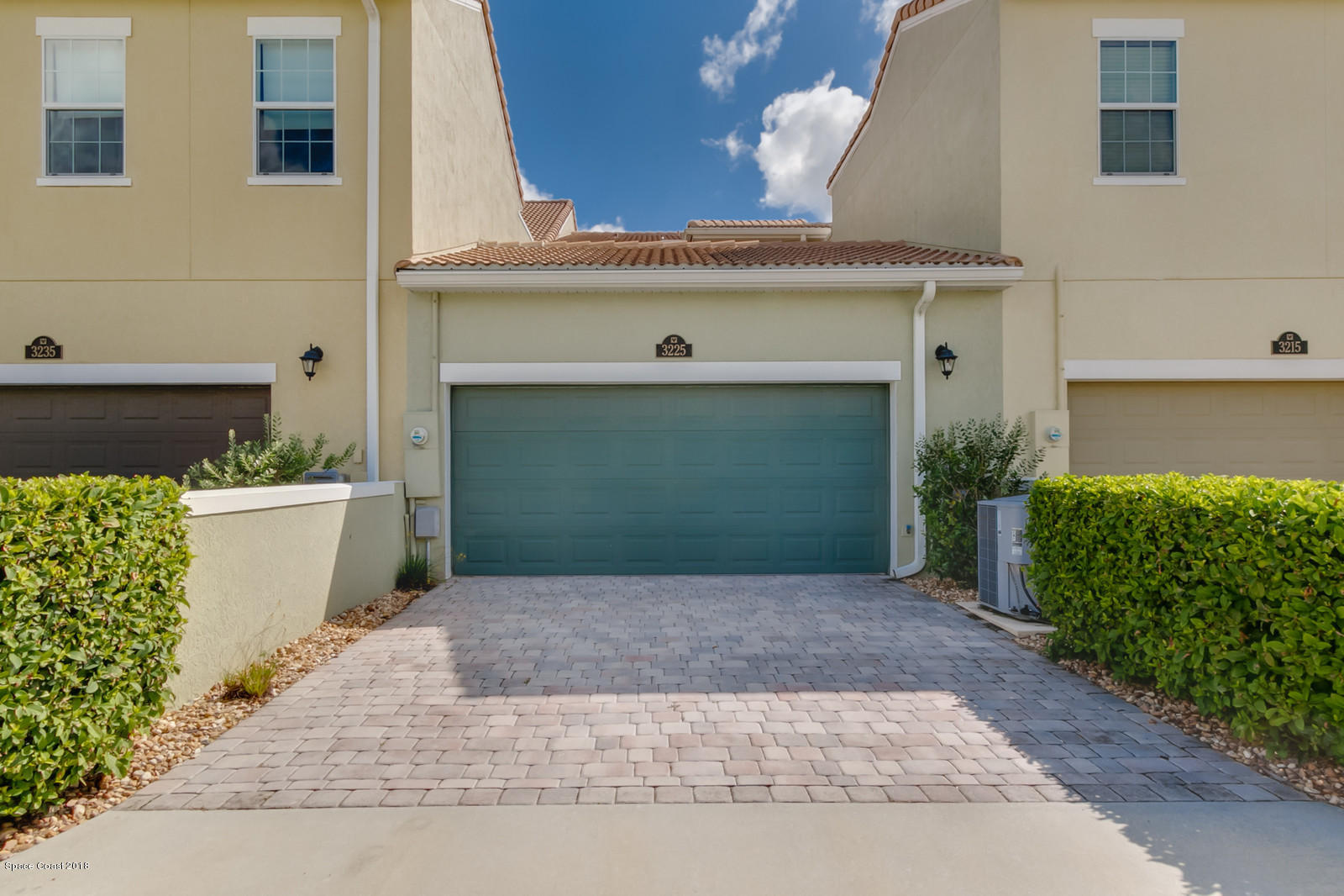 3225 Sedge Drive Rockledge, FL 32955 - Photo 3 of 35 a front view of a house with a garage