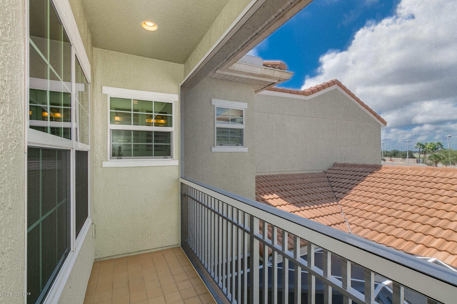 3225 Sedge Drive Rockledge, FL 32955 - Photo 22 of 35 a view of balcony with wooden floor and windows