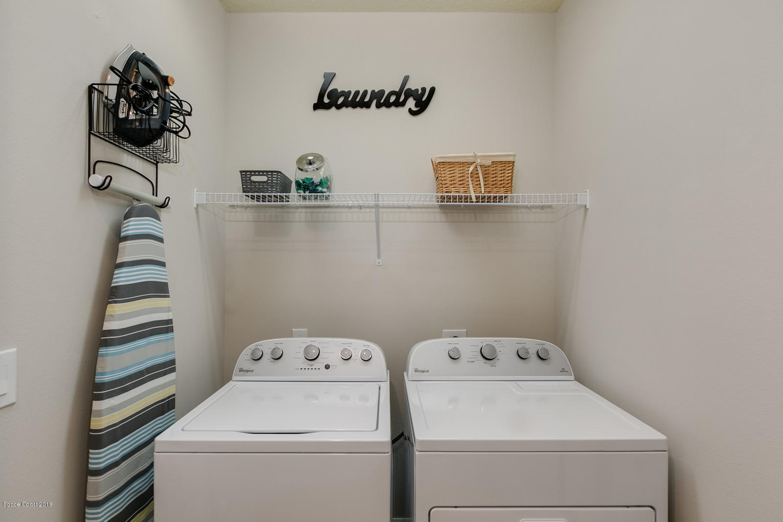 3225 Sedge Drive Rockledge, FL 32955 - Photo 26 of 35 a utility room with dryer and washer