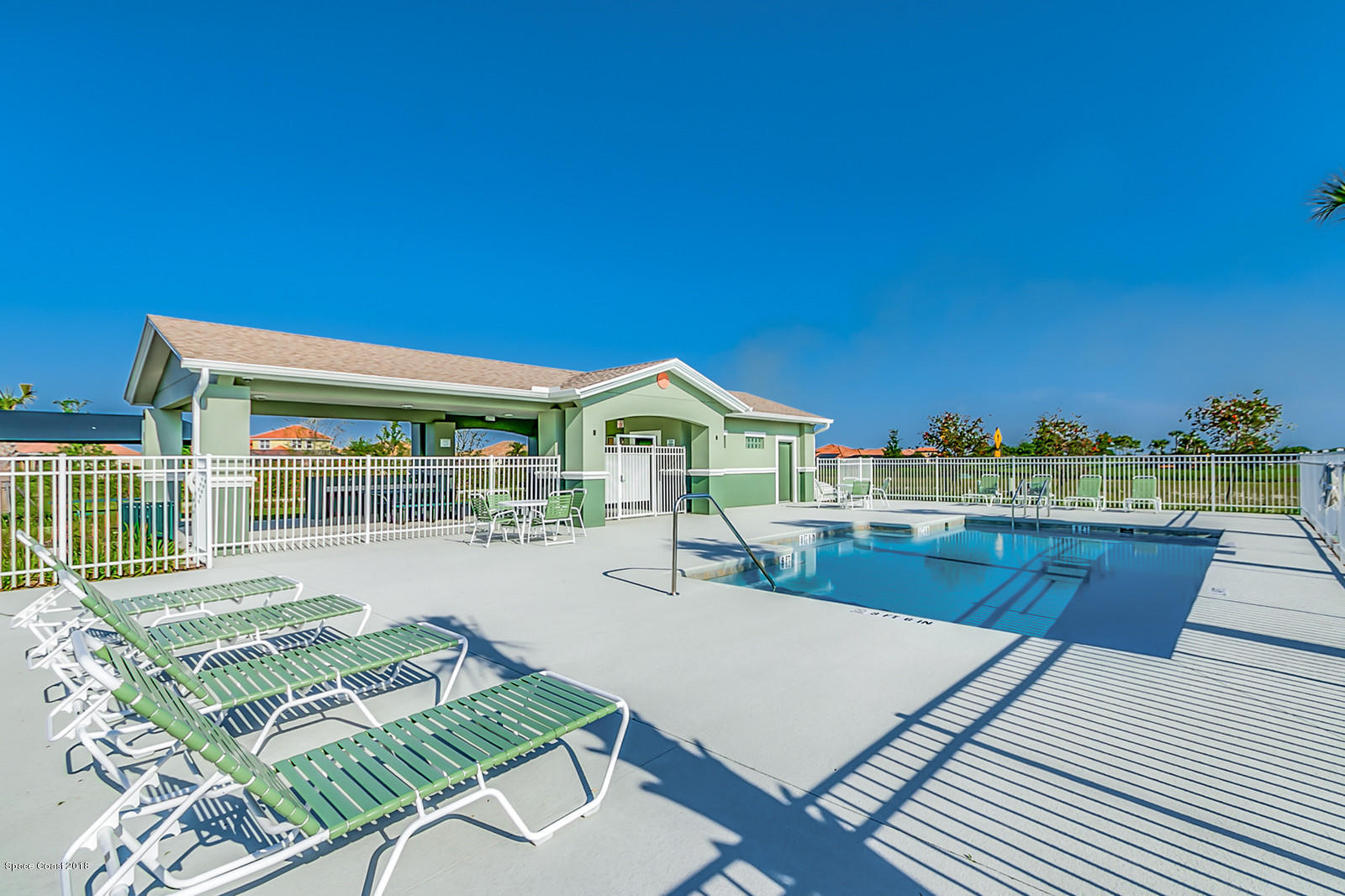 3225 Sedge Drive Rockledge, FL 32955 - Photo 30 of 35 a view of a house with swimming pool and sitting area