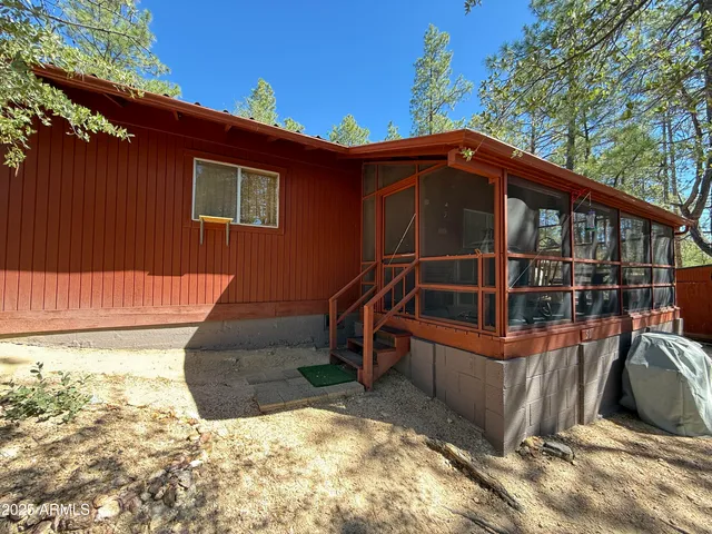 a view of a balcony with chairs