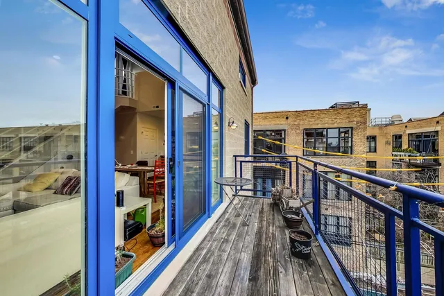 a balcony with a city view