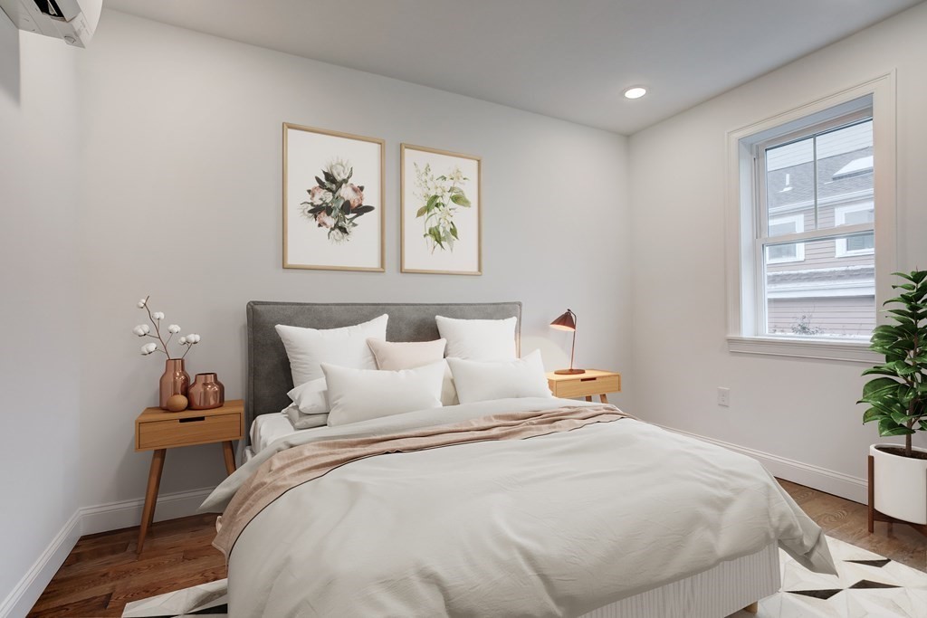 2 Coral Place Boston, MA 02129 - Photo 15 of 17 a bedroom with bed and window