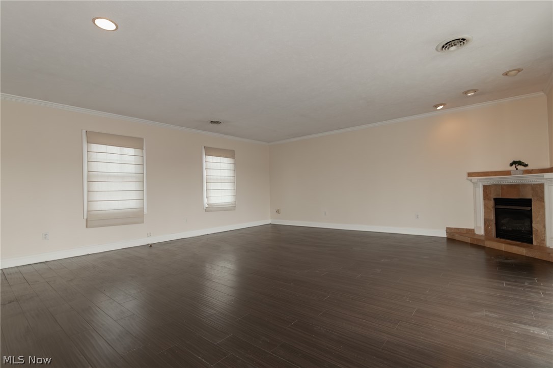 30200 Ridge Road Wickliffe, OH 44092 - Photo 27 of 43 Master Bedoom hardwood floors with fireplace