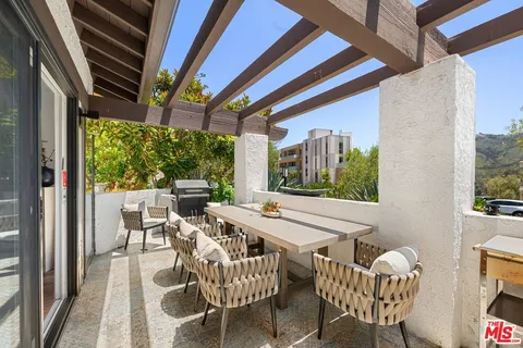 a view of an outdoor space with seating area