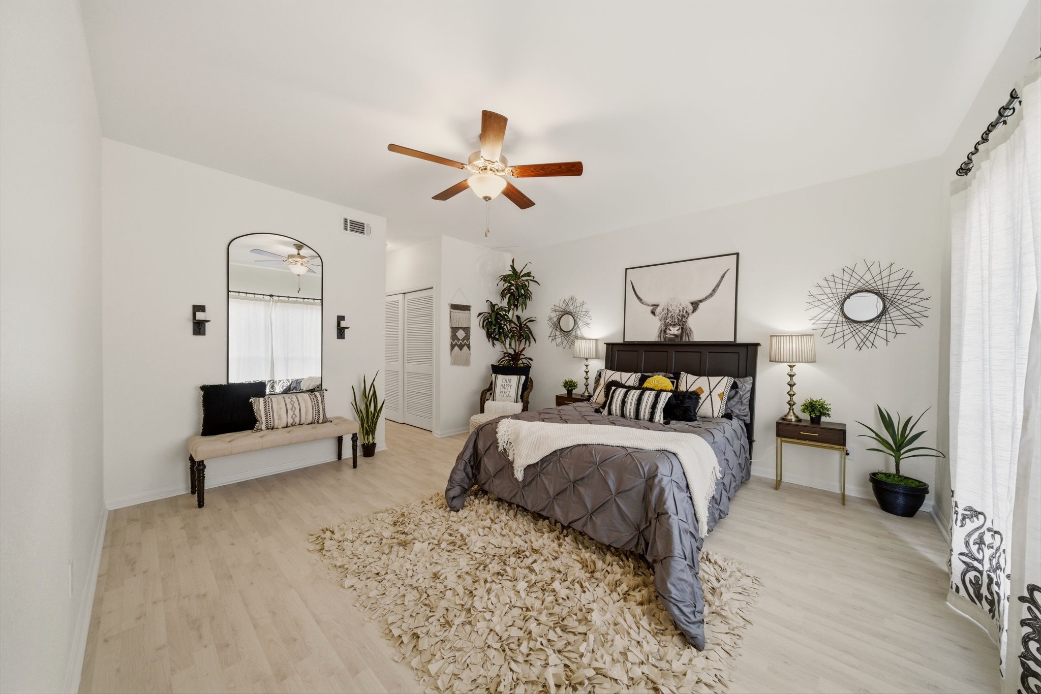 2100 Tanglewilde Street, Unit 750 Houston, TX 77063 - Photo 12 of 23 Extra large primary bedroom suite. Additional storage with an updated bathroom.