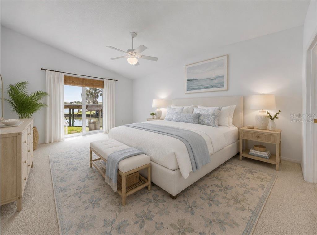 192 Azalea Road Edgewater, FL 32141 - Photo 22 of 94 a bedroom with a large bed and a window