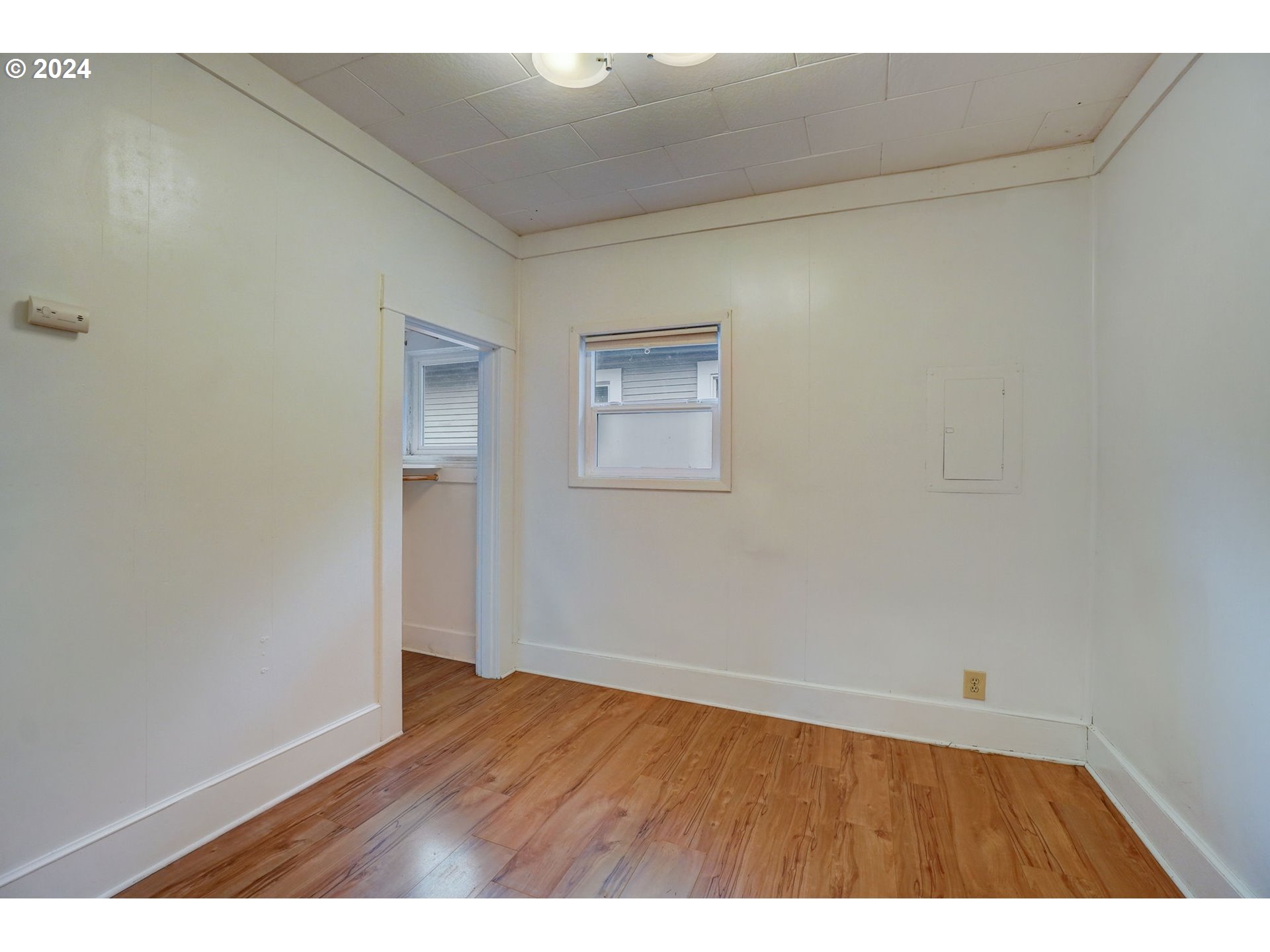 1248 North Watts Street Portland, OR 97217 - Photo 24 of 36 a view of an empty room with wooden floor