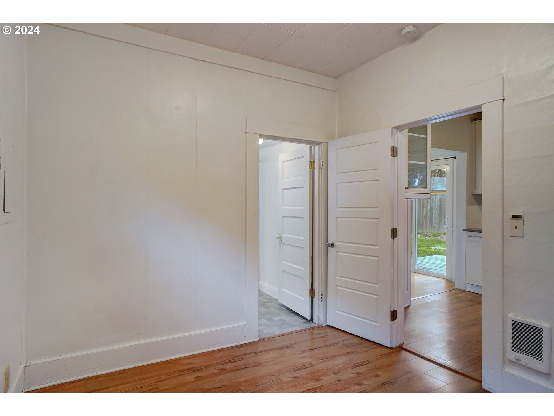 1248 North Watts Street Portland, OR 97217 - Photo 25 of 36 an empty room with wooden floor