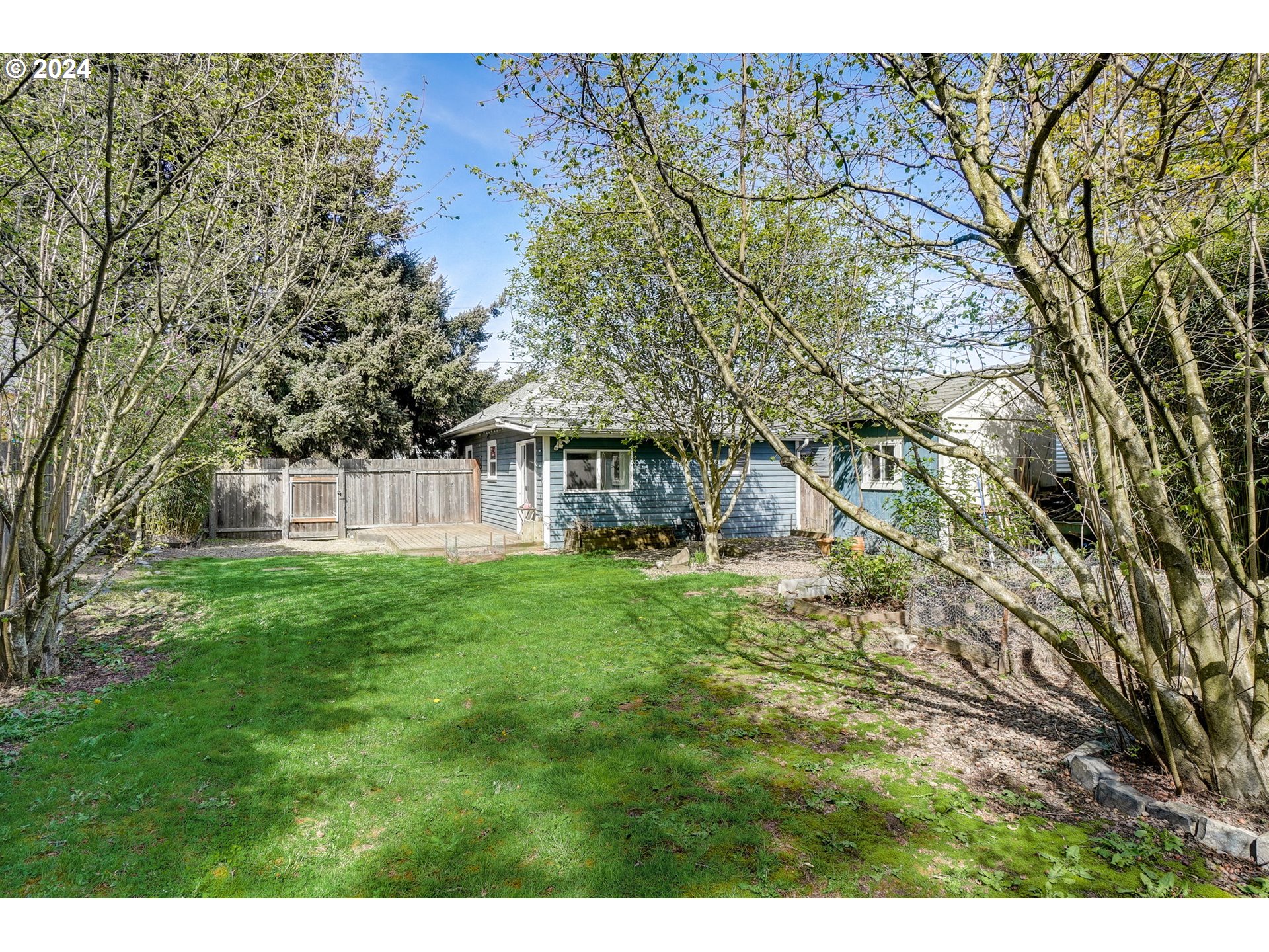 1248 North Watts Street Portland, OR 97217 - Photo 32 of 36 a view of a yard with a large tree