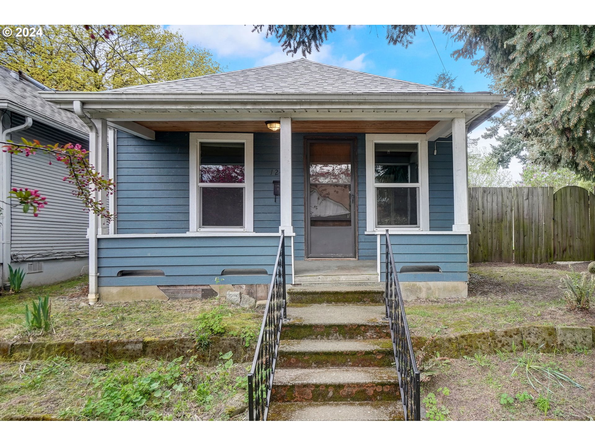 1248 North Watts Street Portland, OR 97217 - Photo 5 of 36 a view of a house with wooden fence
