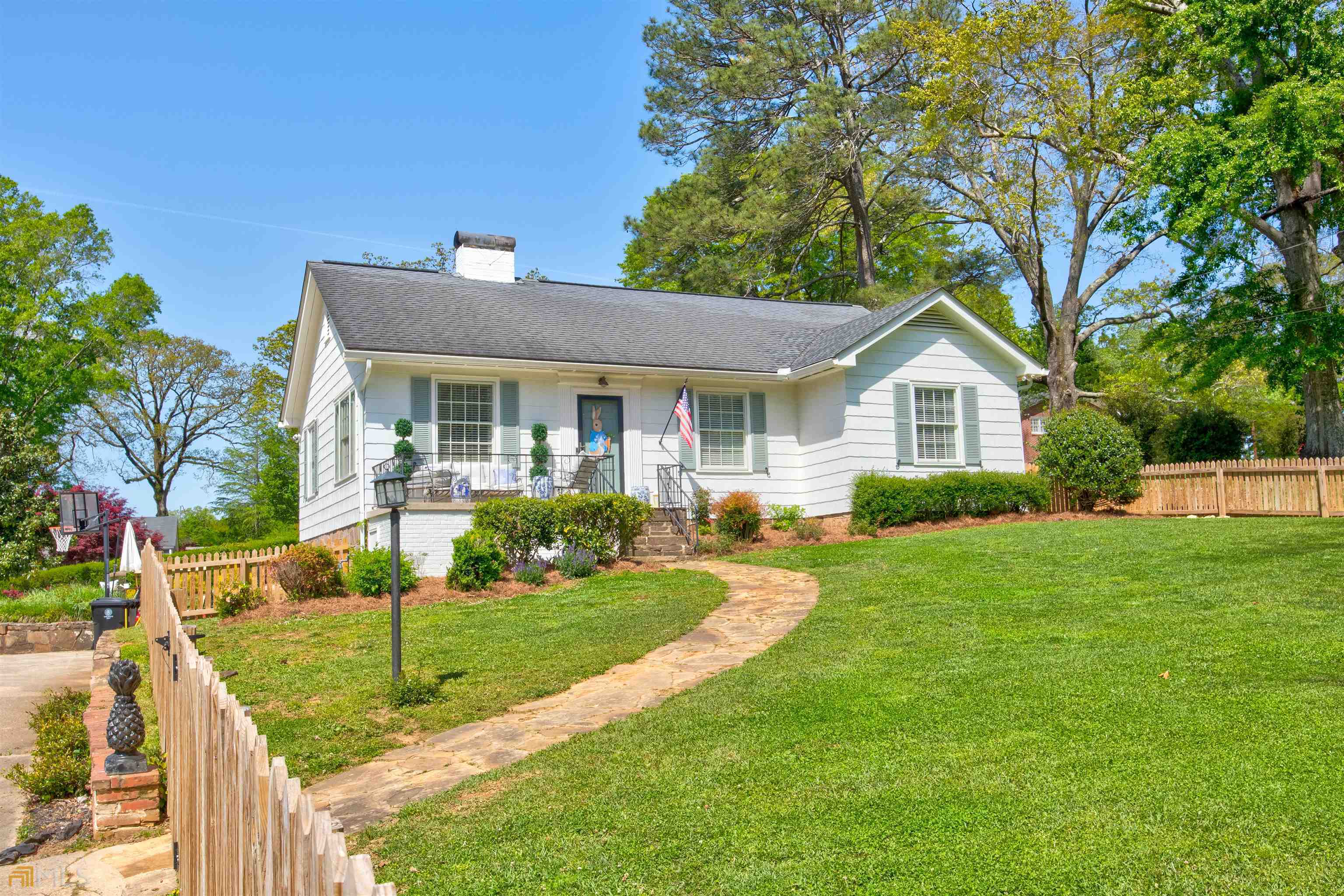 204 Turner Chapel Road Southeast Rome, GA 30161 - Photo 1 of 1 a front view of a house with a yard