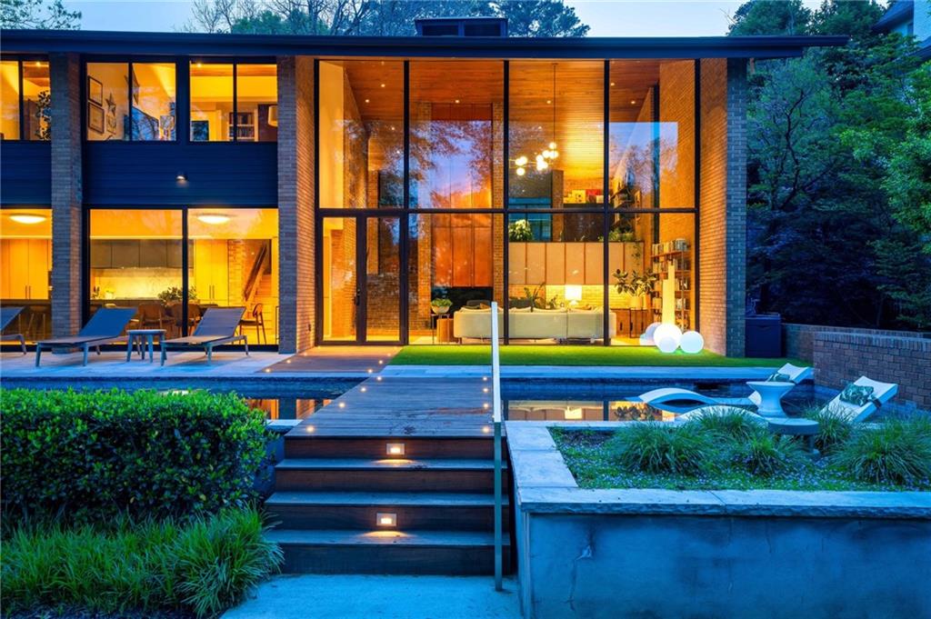 1671 Friar Tuck Road Northeast Atlanta, GA 30309 - Photo 2 of 63 a view of swimming pool with a yard