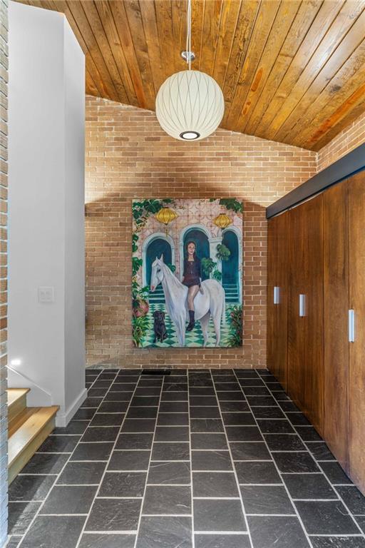 1671 Friar Tuck Road Northeast Atlanta, GA 30309 - Photo 29 of 63 a bathroom with a sink a toilet and shower