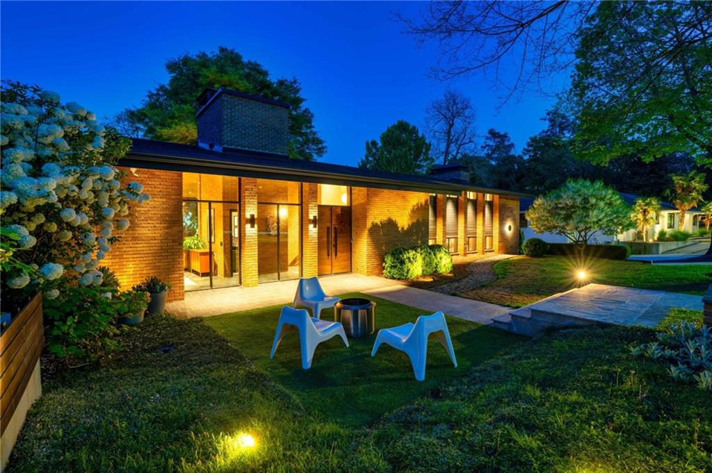 1671 Friar Tuck Road Northeast Atlanta, GA 30309 - Photo 3 of 63 a view of yard with swimming pool and outdoor seating