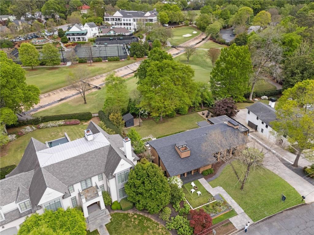 1671 Friar Tuck Road Northeast Atlanta, GA 30309 - Photo 49 of 63 an aerial view of a house with a lake view