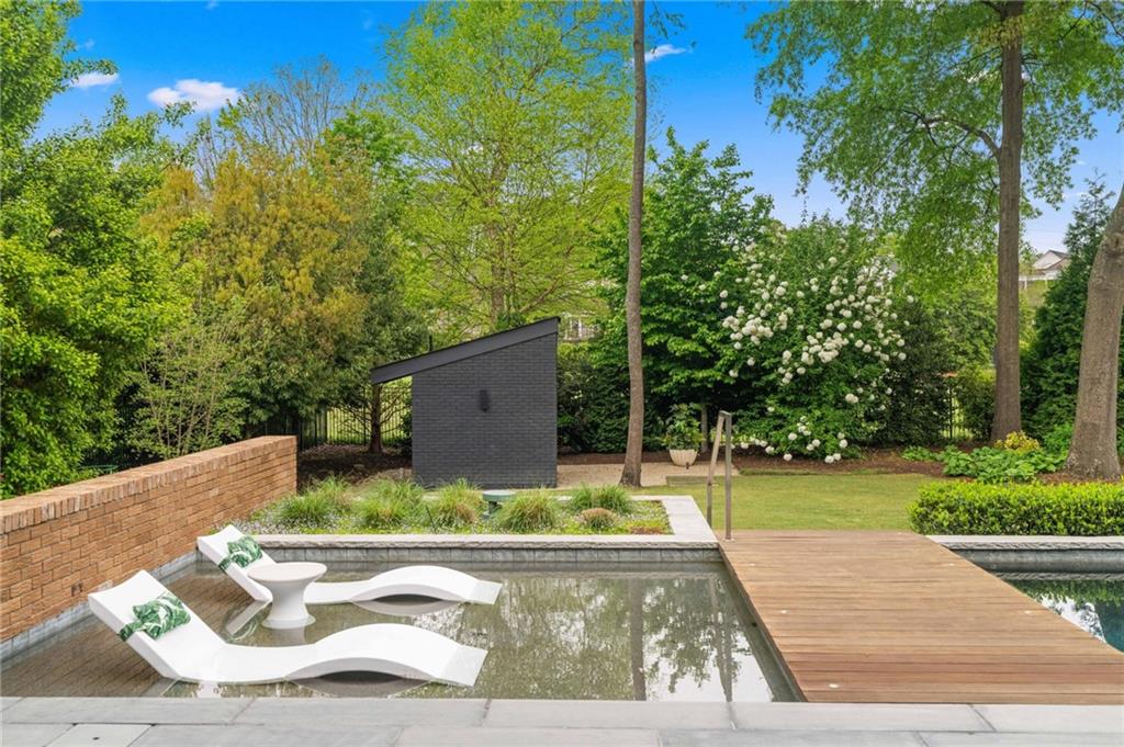 1671 Friar Tuck Road Northeast Atlanta, GA 30309 - Photo 59 of 63 a view of a back yard