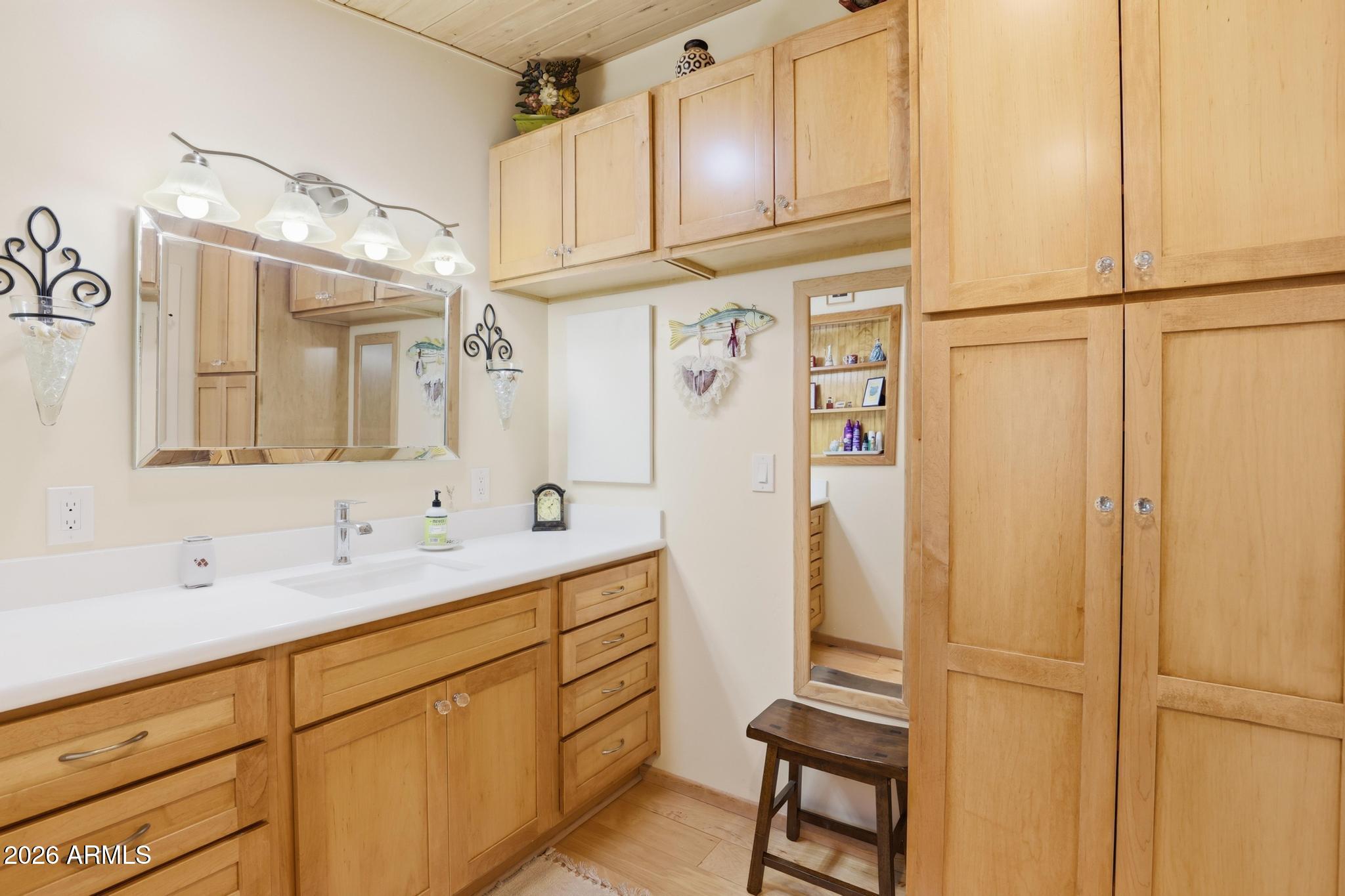 396 Leisure Lane Payson, AZ 85541 - Photo 20 of 61 a bathroom with a sink a mirror and a shower