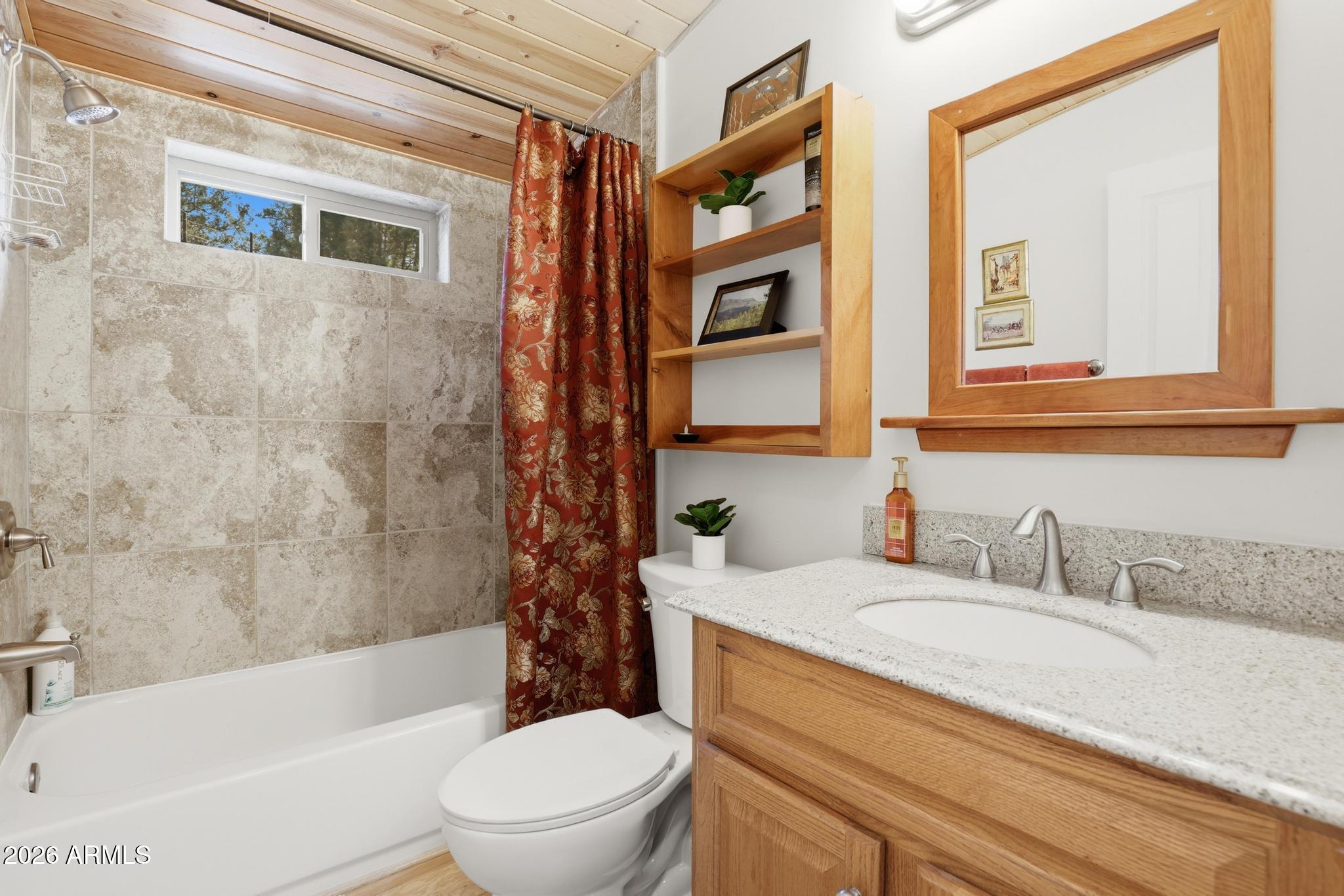 396 Leisure Lane Payson, AZ 85541 - Photo 22 of 61 a bathroom with a granite countertop sink toilet and shower