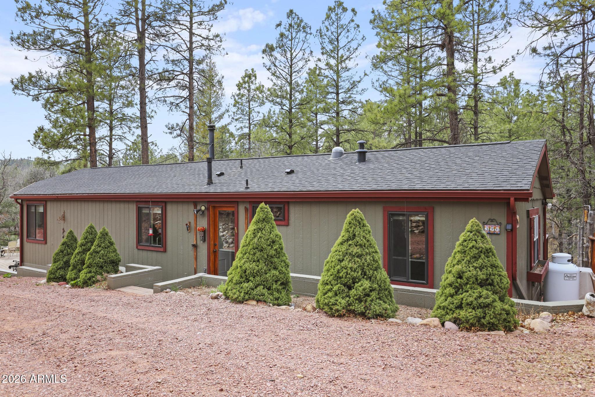 396 Leisure Lane Payson, AZ 85541 - Photo 25 of 61 front view of a house with potted plants