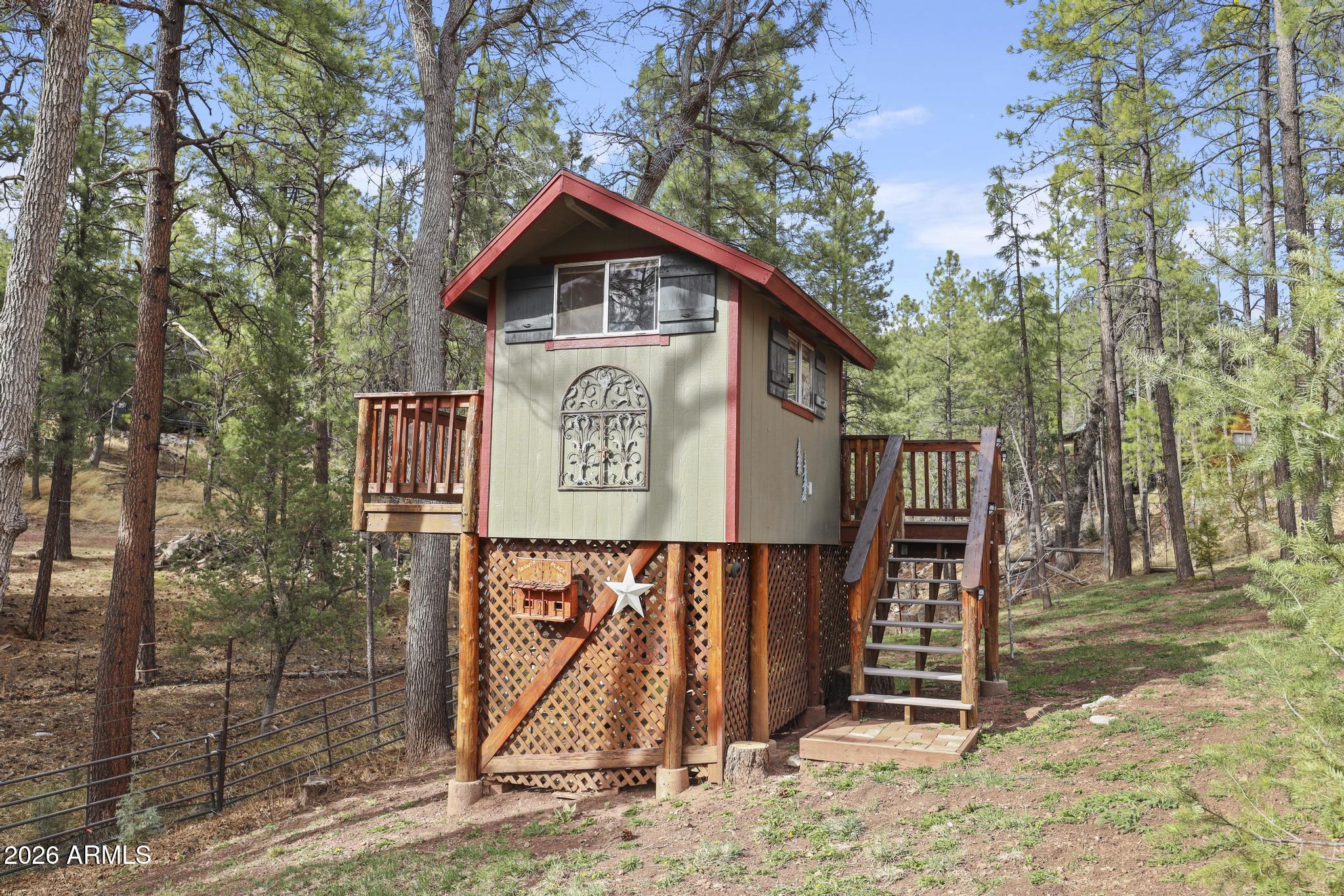 396 Leisure Lane Payson, AZ 85541 - Photo 35 of 61 a view of outdoor space with a sink and wooden fence