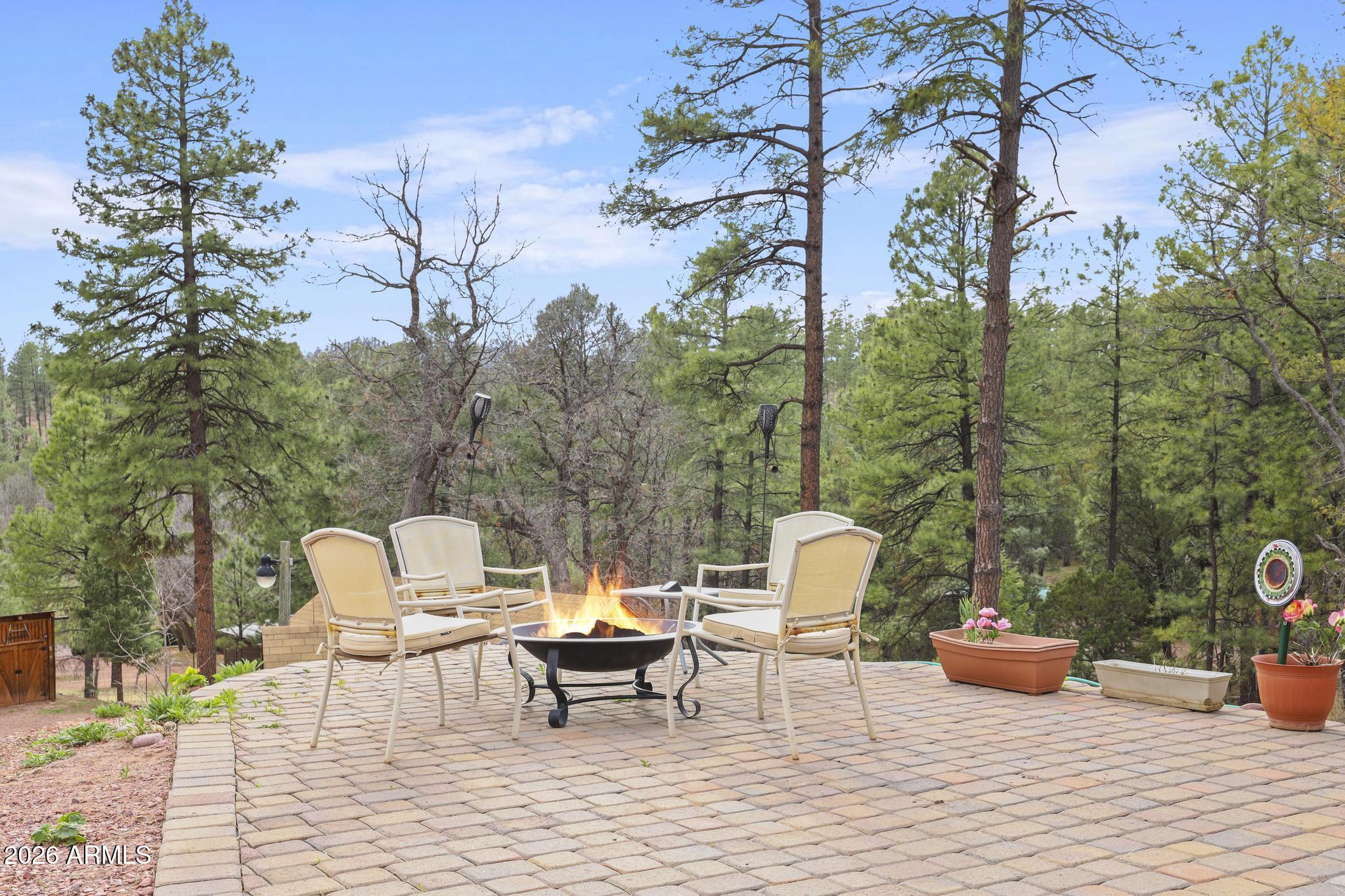 396 Leisure Lane Payson, AZ 85541 - Photo 4 of 61 a backyard of a house with table and chairs
