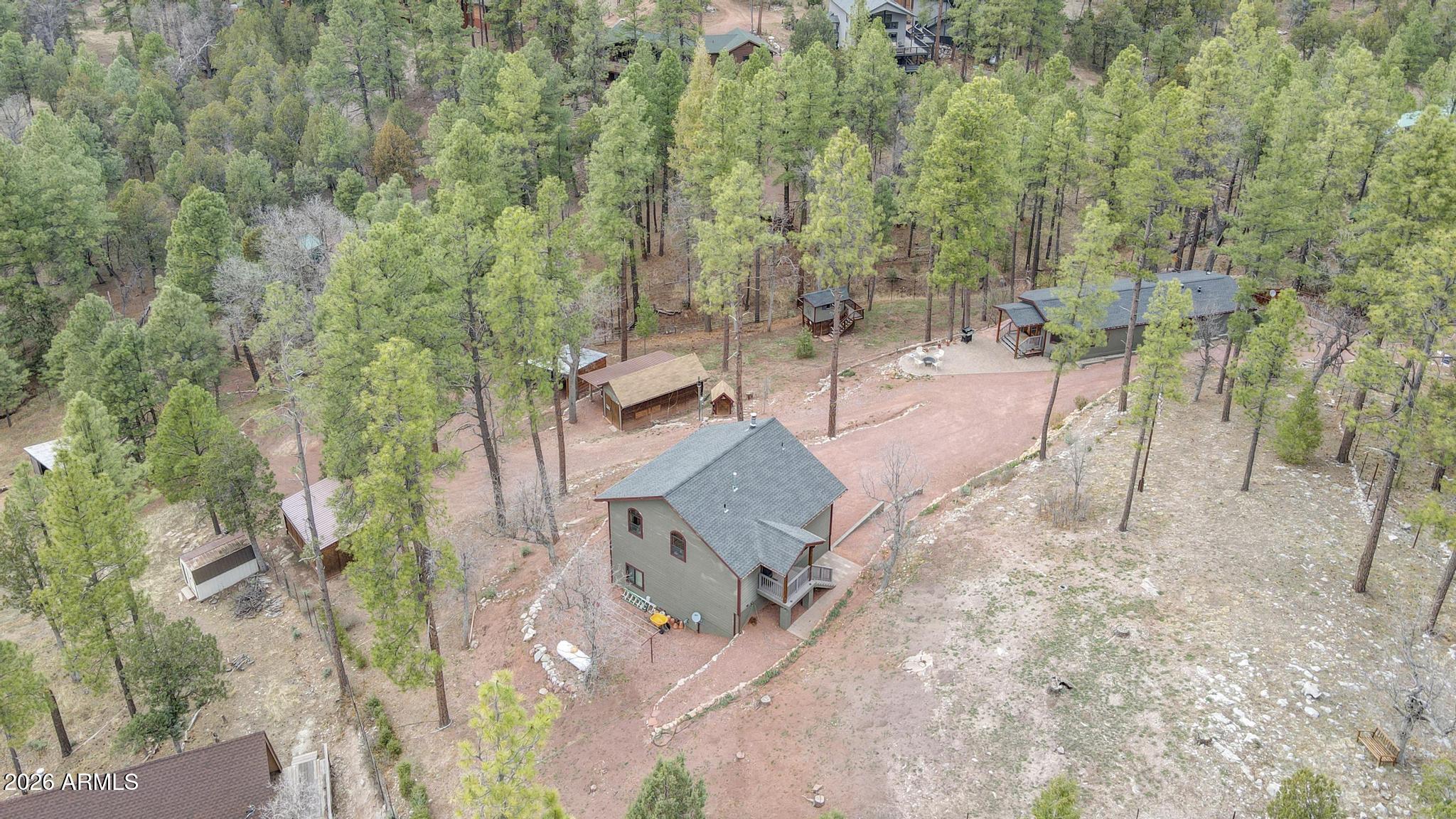 396 Leisure Lane Payson, AZ 85541 - Photo 54 of 61 an aerial view of a house with a yard and sitting area