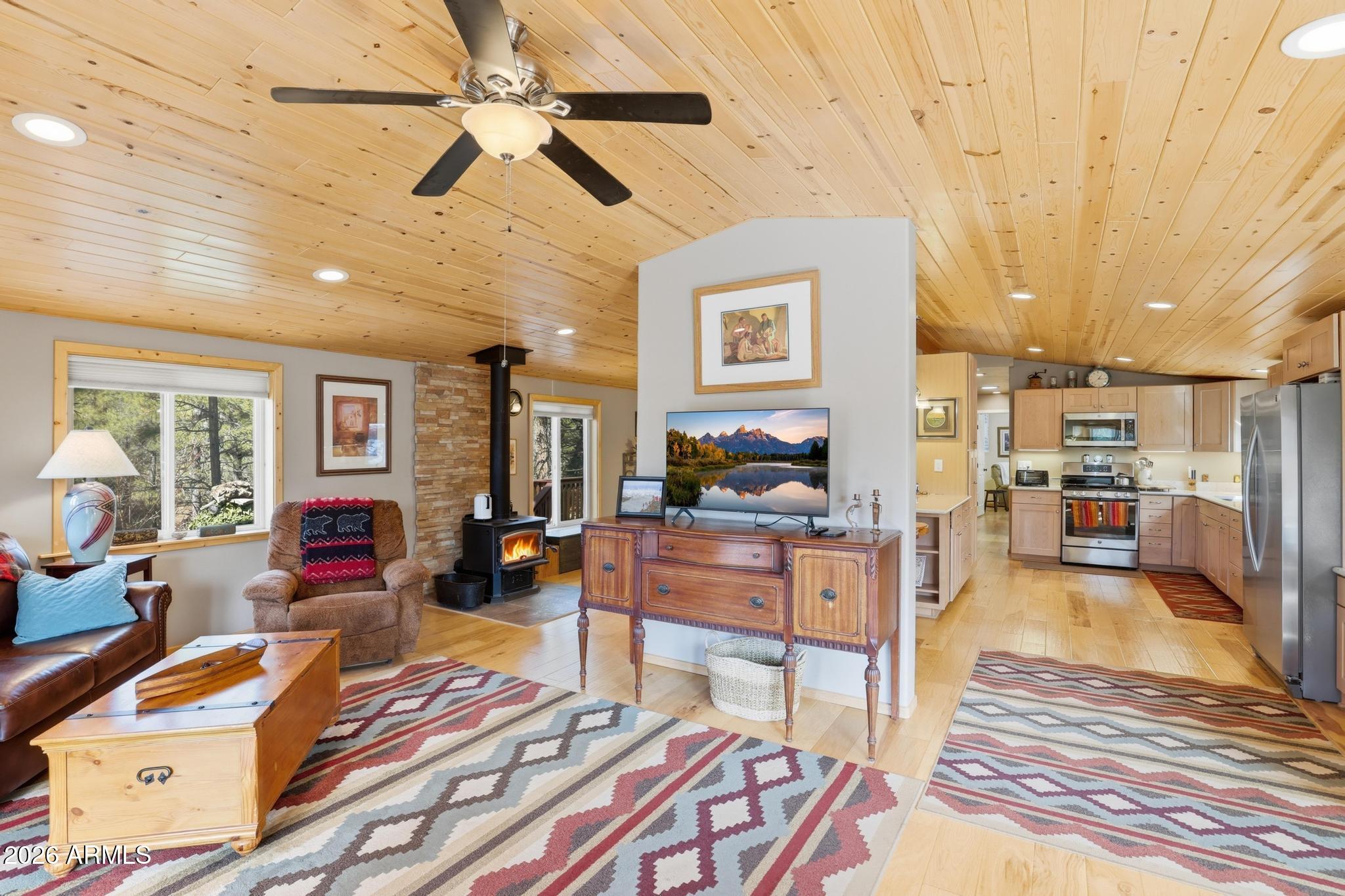 396 Leisure Lane Payson, AZ 85541 - Photo 6 of 61 a living room with furniture and a flat screen tv