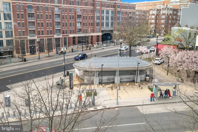 a view of a building with a street