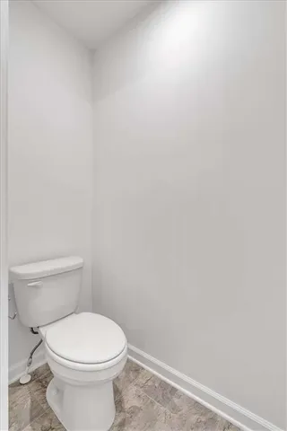 a bathroom with a shower and a sink