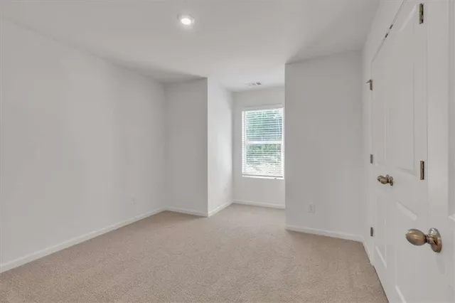 a bathroom with a sink toilet vanity tub and shower