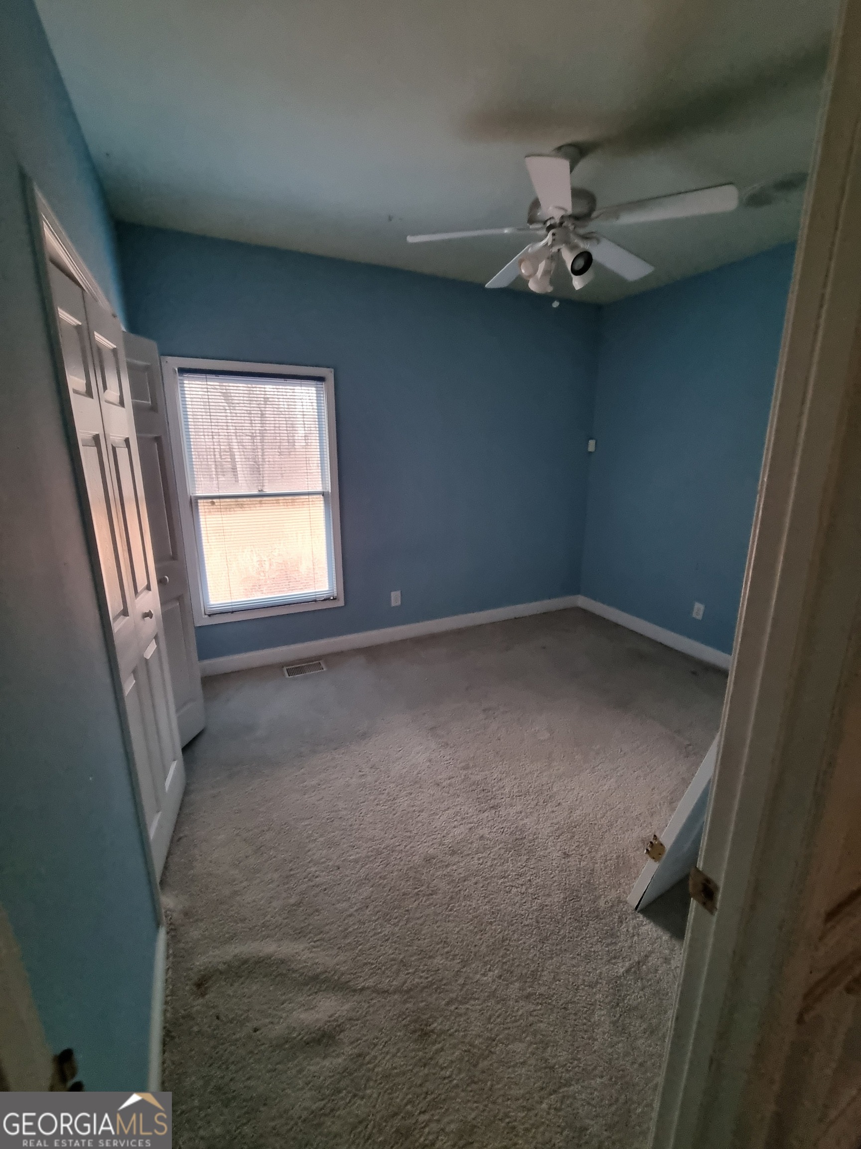 6235 Short Road Fairburn, GA 30213 - Photo 11 of 32 en empty room with windows