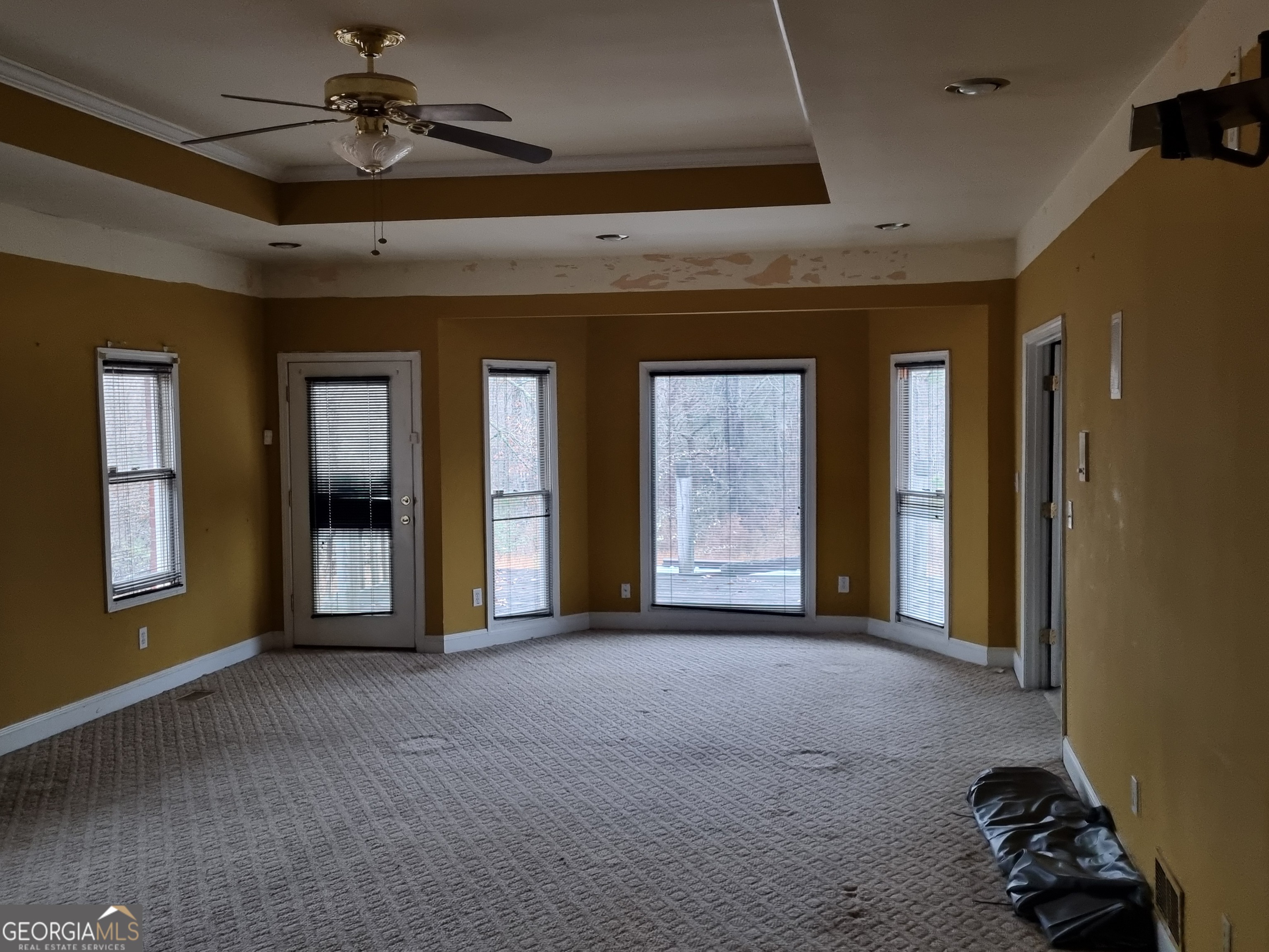 6235 Short Road Fairburn, GA 30213 - Photo 23 of 32 a view of a livingroom with furniture and windows
