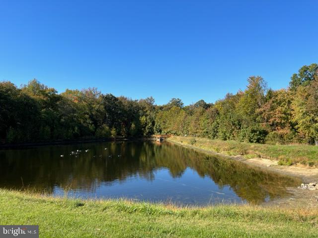 167 Woods Way Elkton, MD 21921 - Photo 43 of 46 Enjoy Strolls Along the Nearby Community Pond