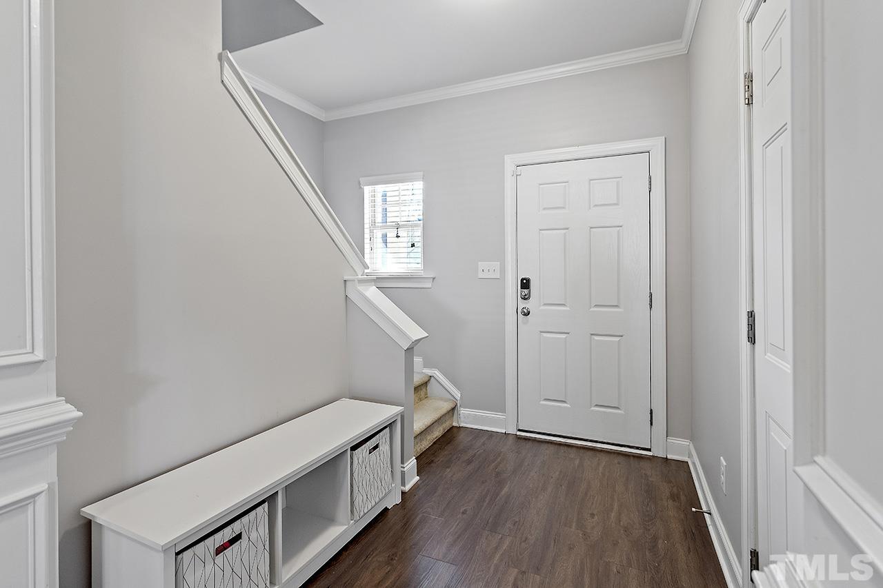 3521 Eastern Branch Road Raleigh, NC 27610 - Photo 3 of 21 a view of an entryway with wooden floor
