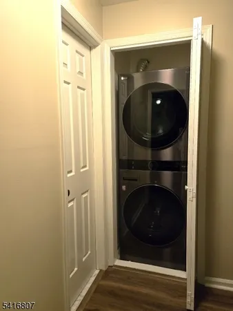 a bathroom with a glass door and mirror