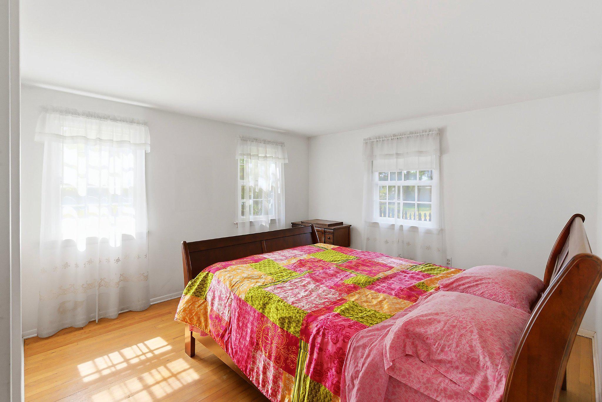464 Newport Road Forked River, NJ 08731 - Photo 11 of 23 a bedroom with a bed and a window