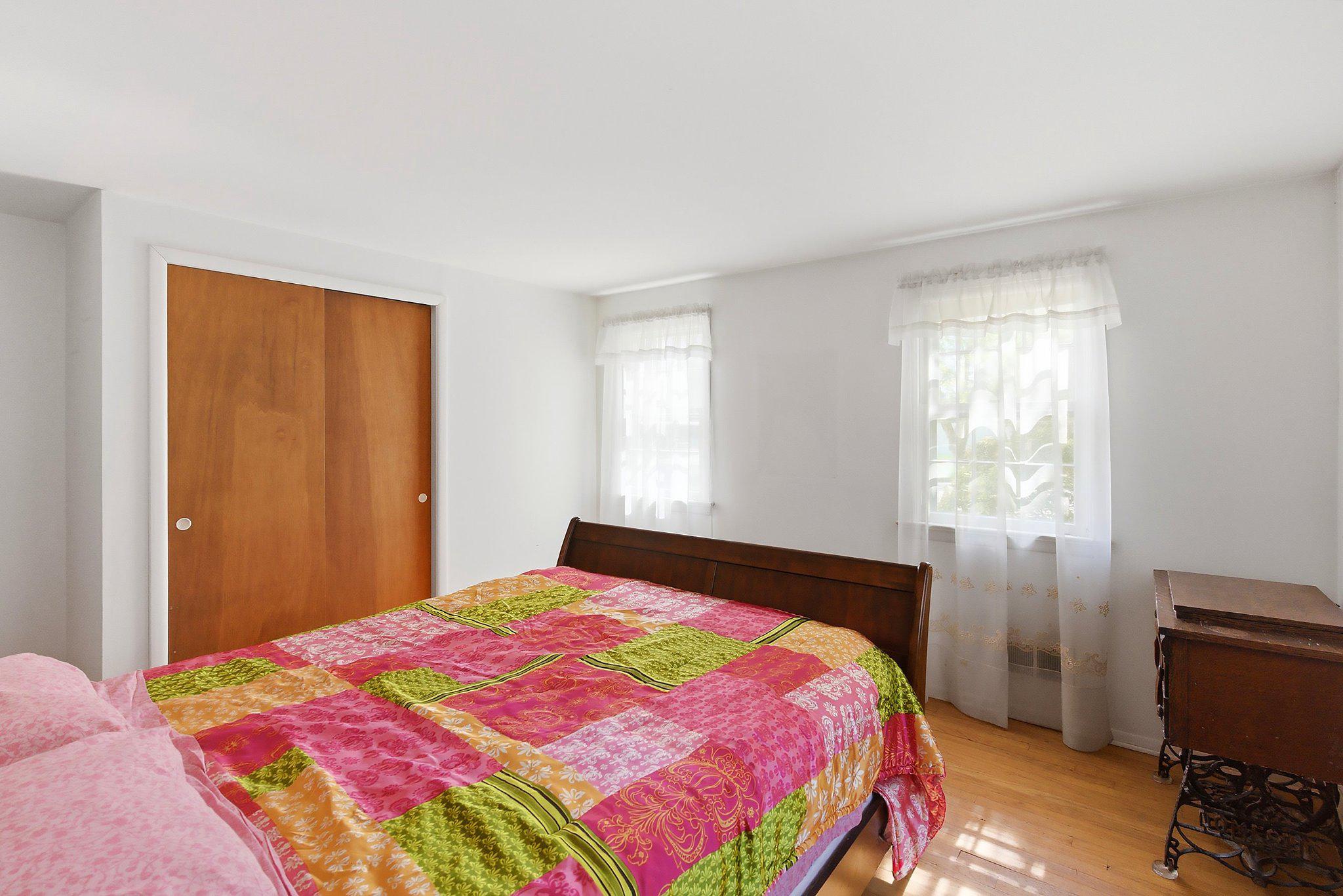 464 Newport Road Forked River, NJ 08731 - Photo 12 of 23 a bedroom with a bed and a window