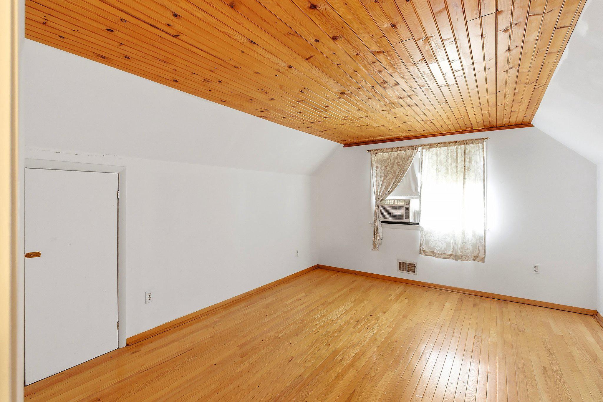 464 Newport Road Forked River, NJ 08731 - Photo 14 of 23 a view of empty room with wooden floor and fan