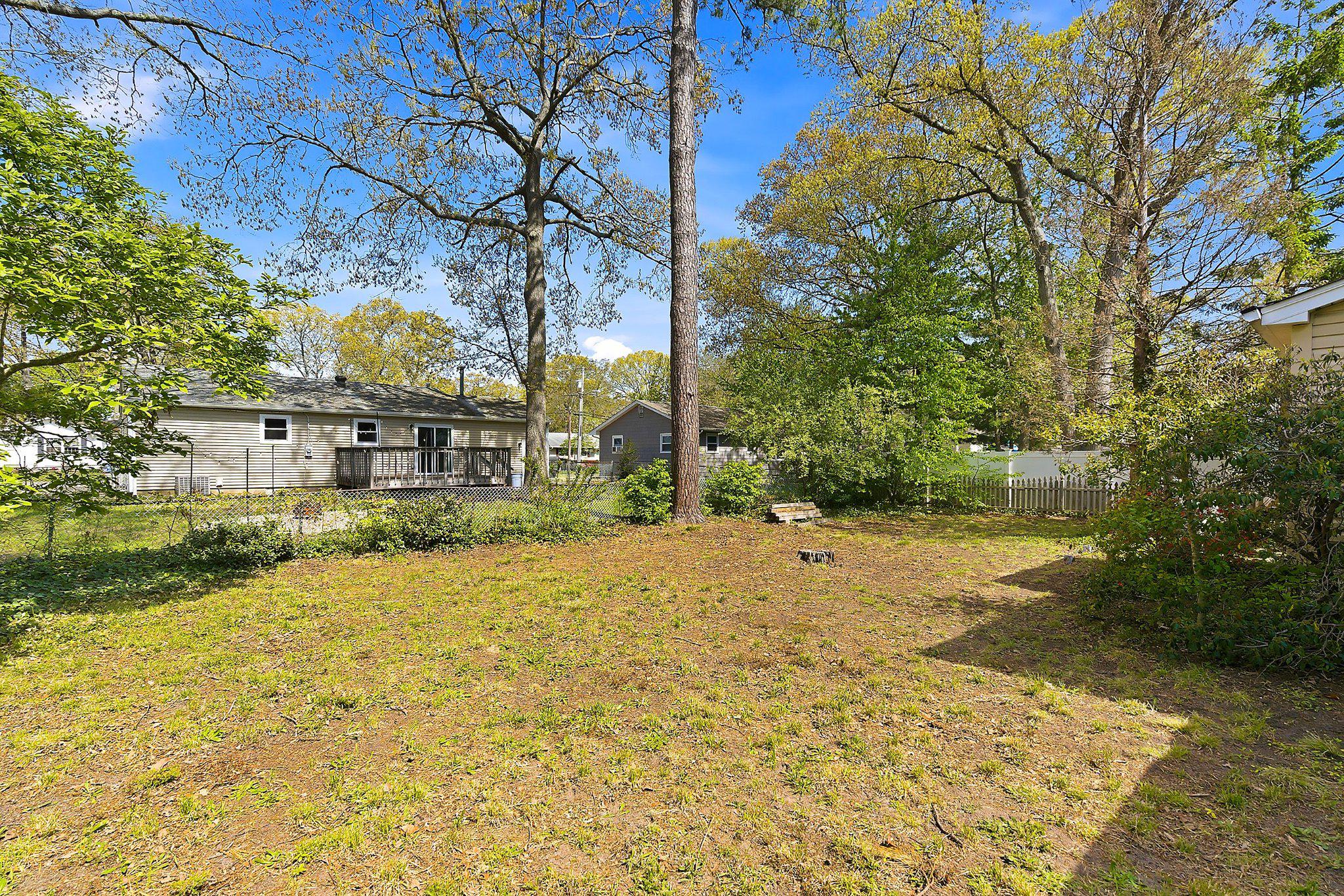 464 Newport Road Forked River, NJ 08731 - Photo 23 of 23 a view of a yard with plants and trees