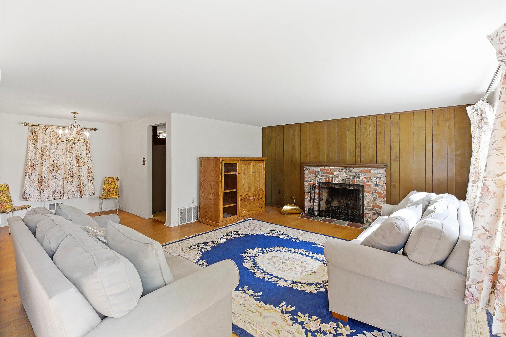 464 Newport Road Forked River, NJ 08731 - Photo 5 of 23 a living room with furniture a fireplace and a flat screen tv
