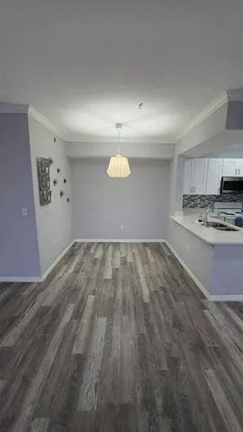 a kitchen with a stove and a sink